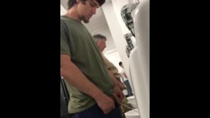 Über-cute Guy Pissing knows he's being Watched by a Creepy Older Man.