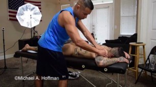 Muscle Tattoed Man Massaged