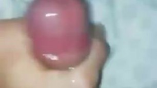 Teen boy strokes his cock and cums
